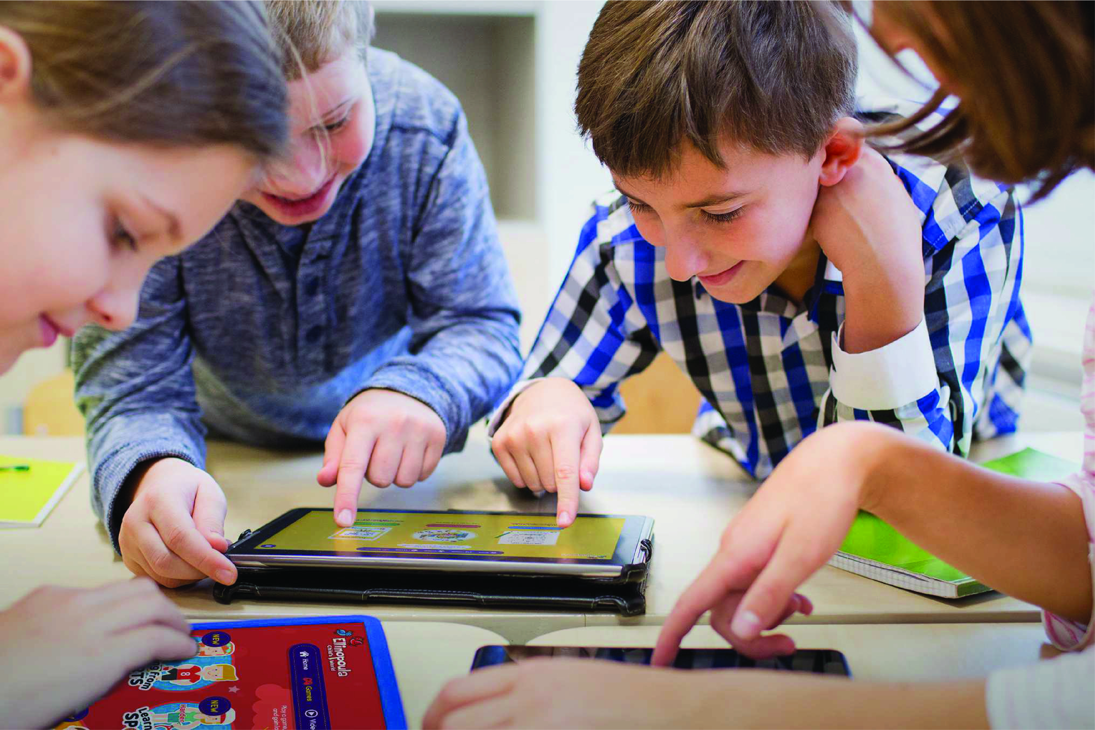 Kids learning Greek on their tablet using the Ellinopoula app