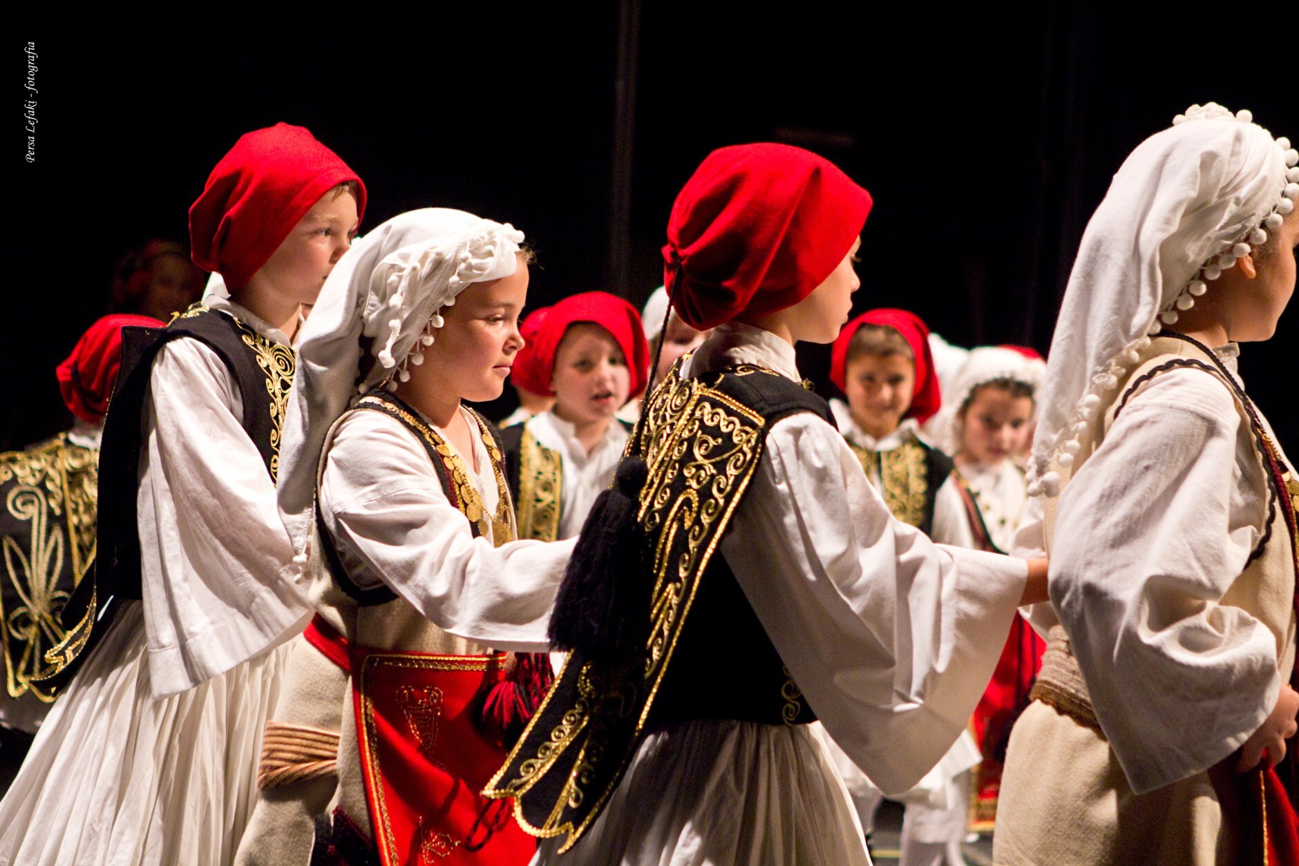 Young greek children dancing Greek folk dances